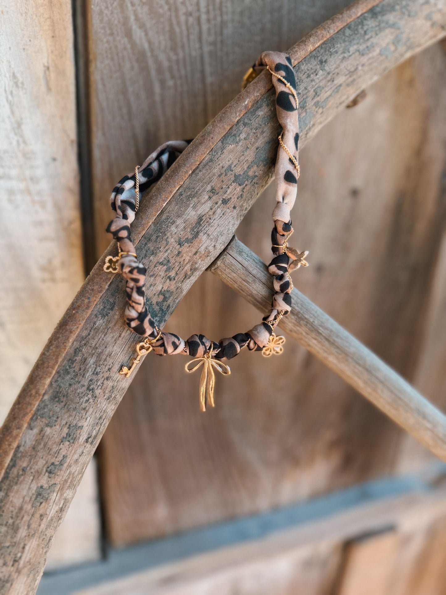 Gold Bow and Multi Charm Pendant Scarf Necklace - Leopard